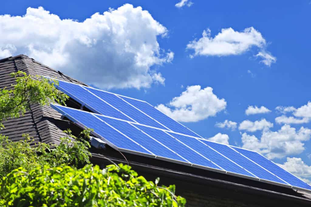 Home with solar panels to save on energy costs